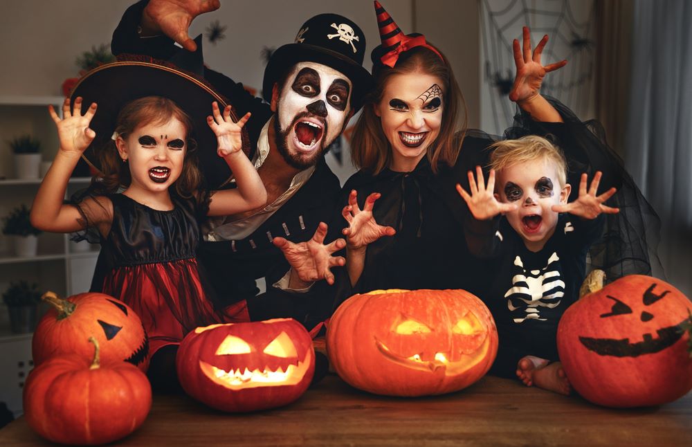 Halloween Offers and Experiences at The Westville Hotel Enniskillen Family dressed up for halloween with pumpkins - halloween breaks Enniskillen