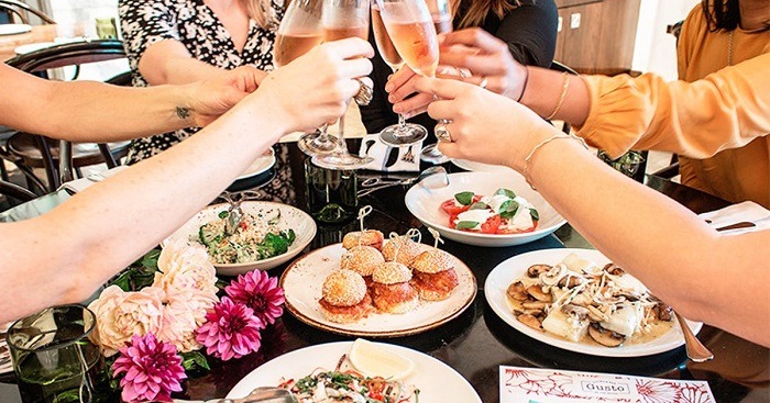 wine and dine with a ladies lunch at the westville hotel ladies toasting with flutes of champagne and enjoying dishes and appetisers