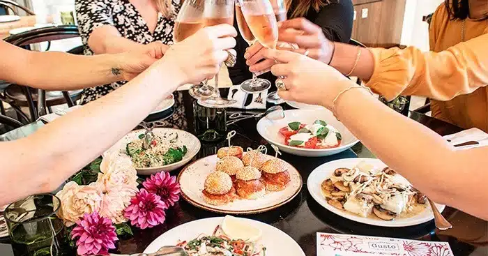 wine and dine with a ladies lunch at the westville hotel ladies toasting with flutes of champagne and enjoying dishes and appetisers
