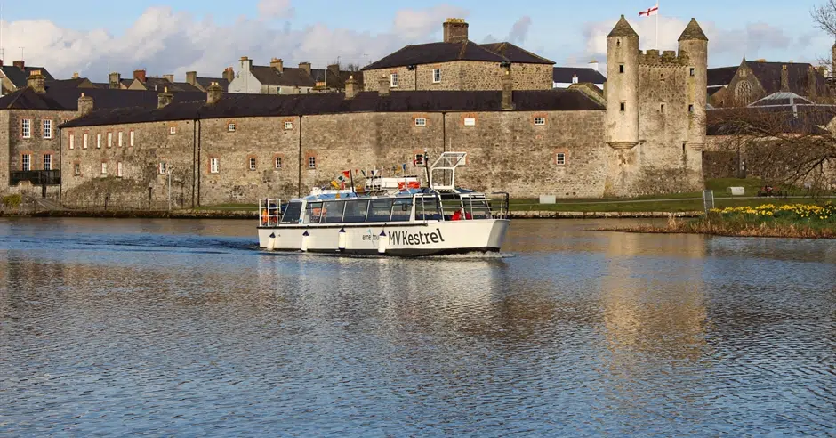 Island Town Dinner Cruise boat sailing past Enniskillen Castle on the River Erne - Dine and Cruise at The Westville Hotel