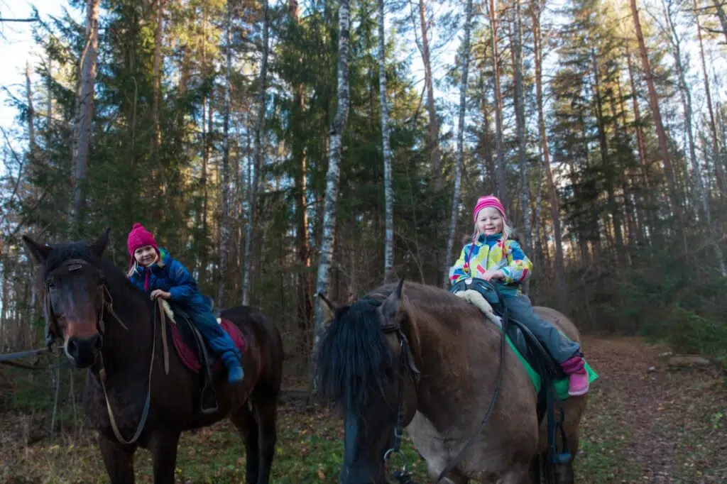 Little girls horse ride in nature, family fun in Fermanagh family-friendly Enniskillen