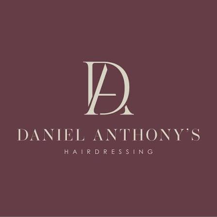 Logo for "Daniel Anthony's Hairdressing" with large stylised initials "DA" above the business name on a maroon background.
